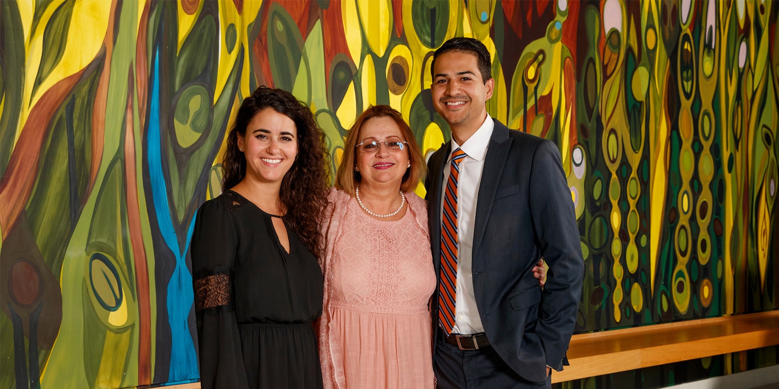 Jorge Soriano with his wife, Hilary, and mother