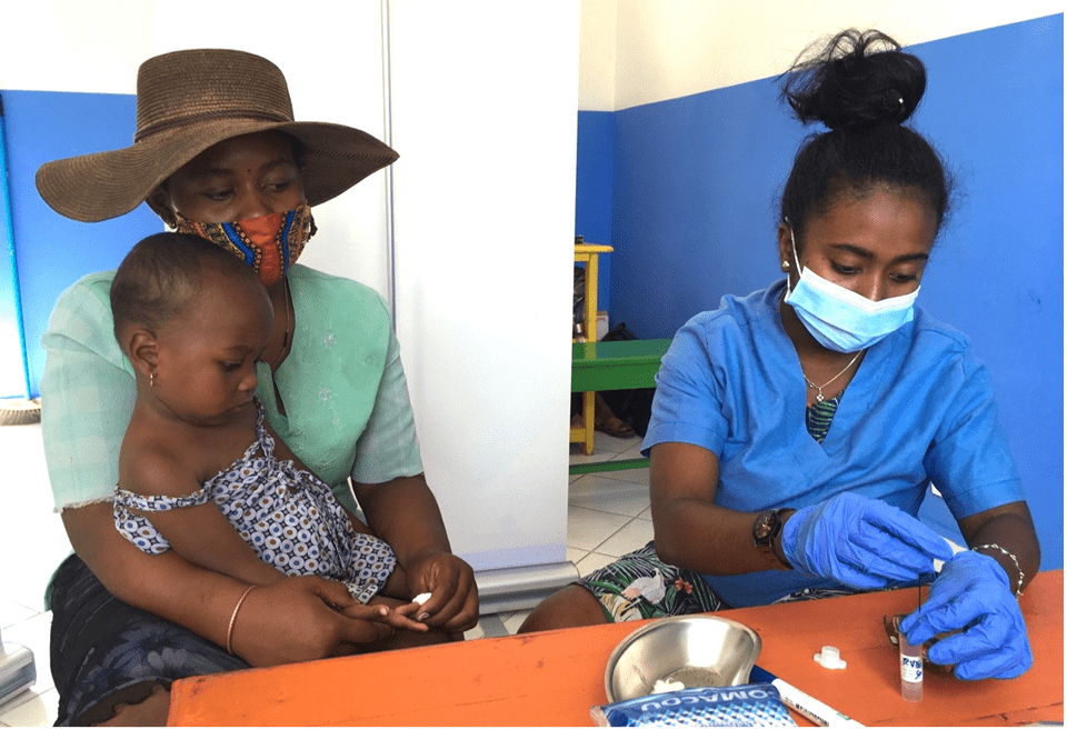 Staff in Madagascar check blood lead levels in children