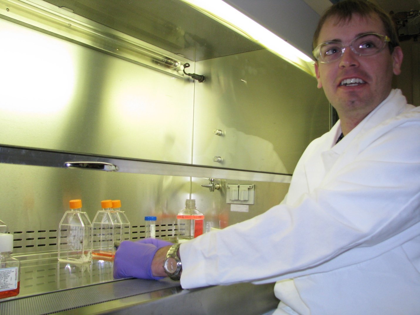 Dr. Richard Connolly working in a laboratory.